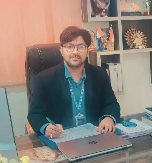 Shri. Avinash J Naik, Principal